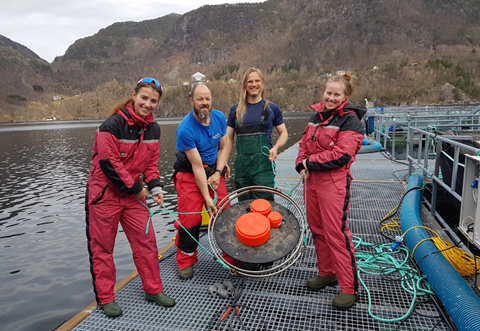 Photo of team with equipment 